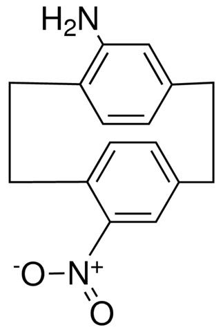 12-NITRO-TRICYCLO(8.2.2.2(4,7))HEXADECA-1(13),4,6,10(14),11,15-HEXAEN-5-YLAMINE